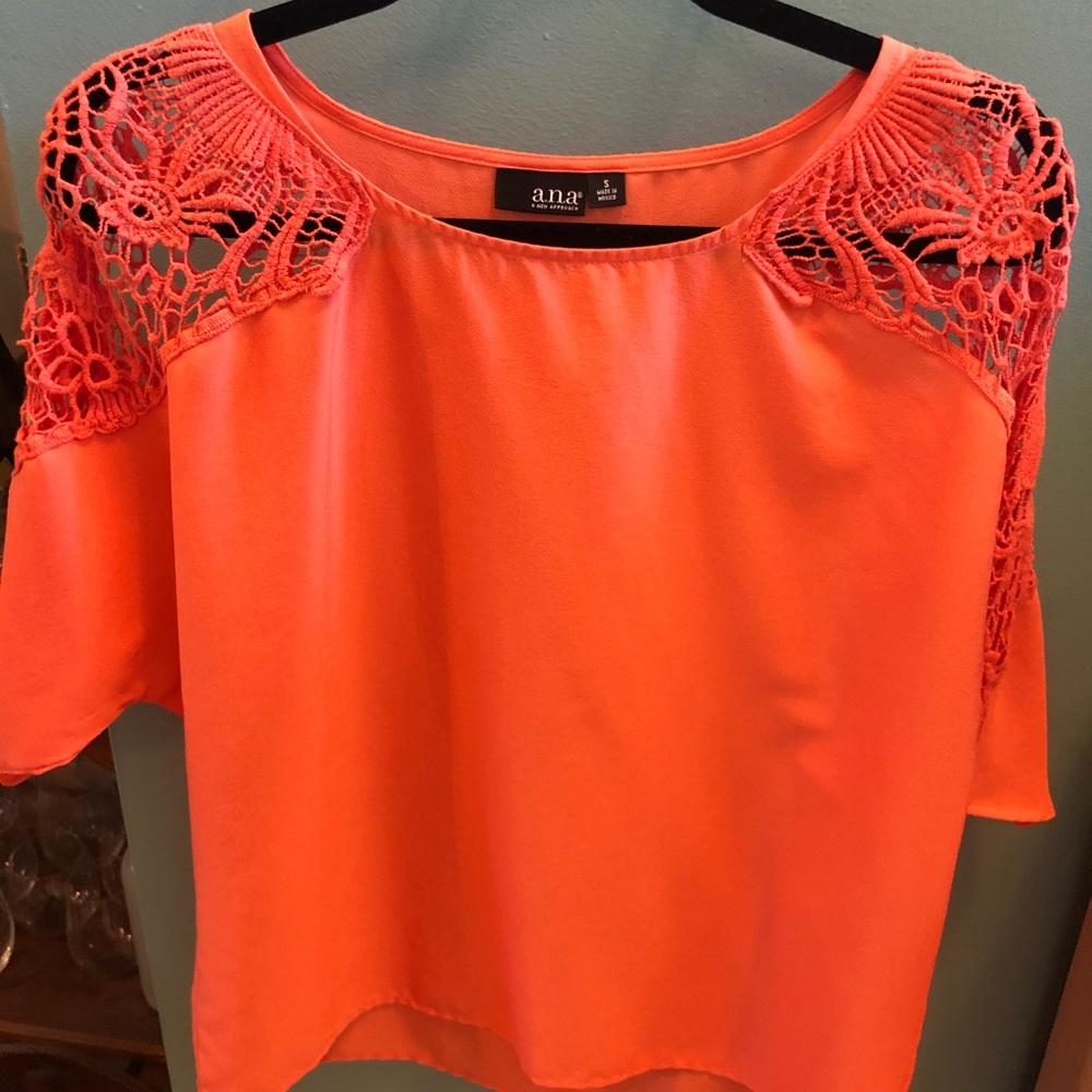 Coral blouse with lace details